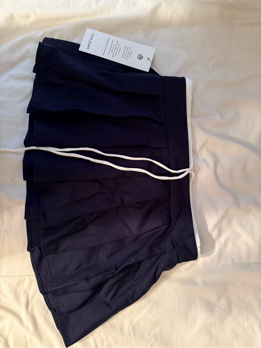 Navy Pleated Tennis Skirt with White Drawstring